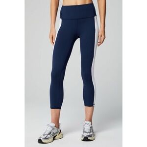 Fabletics On-The-Go PowerHold® High-Waisted Capri in Indigo/Powder Blue